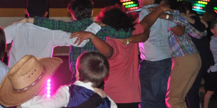 Moms and Sons Make Memories at Hubbard Elementary Dance